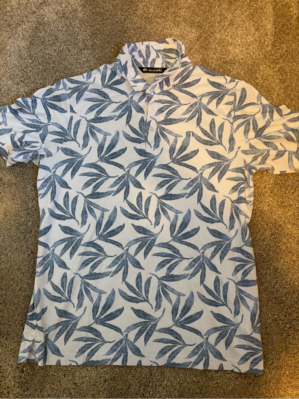 Travis Mathew White Polo with Blue Leaf Print